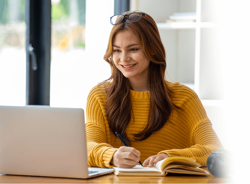 A scholar carefully citing a source in their PhD thesis.