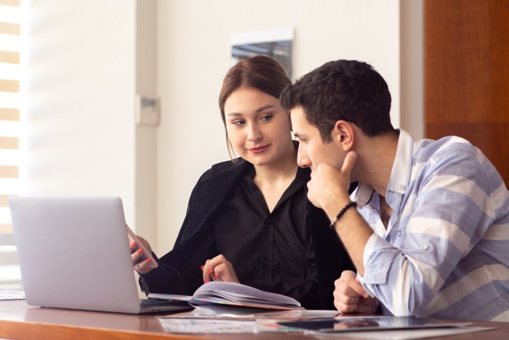 A senior academic consultant at PhD India providing strategic guidance to a doctoral candidate on thesis methodology and structural formatting.